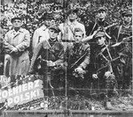 General Michael (Rola) Zymierski (top row, center), commander of the Polish communist Armia Ludowa, poses with a partisan unit in the Parczew Forest.