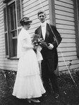 James and Ruth (Stafford) McDonald pose outside the Stafford family home in Albany, Indiana, on their wedding day.
