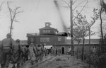 American soldiers march into Buchenwald upon liberation of the camp.