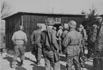American soldiers on an inspection tour of the newly liberated Ohrdruf concentration camp.