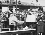 American soldiers force German civilians to view  items made from human skin and body parts, in Buchenwald.