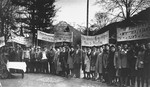 Jewish DPs carrying banners in several languages, protest against British immigration policy in Palestine.