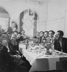 Jewish DPs attend a festive dinner at the Mittenwald displaced persons camp.