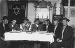 Jewish DPs study religious texts in a synagogue in the Mittenwald displaced persons camp.