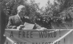 David Treger delivers an address at a demonstration in the Foehrenwald displaced persons camp to protest against the capture and return of the Exodus 1947 immigration ship.