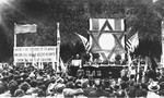 David Treger, President of the Central Committee of the Liberated Jews in Bavaria, delivers an address at a public meeting held in the Mittenwald displaced persons camp to protest British immigration policy in Palestine.