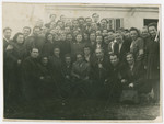 Postwar photograph of survivors from the Kovno and Vilna ghettoes together with the Soviet Jewish author, Ilya Ehrenberg.