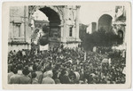 Jewish displaced persons celebrate the UN Partition of Palestine by gathering by the Arch of Titus in Rome.