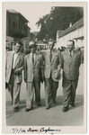 Four delegates to the 22nd Zionist Congress walk down a street in Basel.