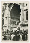 Jewish displaced persons celebrate the UN Partition of Palestine by gathering by the Arch of Titus in Rome.