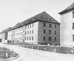 Exterior view of a barrack in Ebelsberg DP camp.  The camp was formerly used for American military personnel.