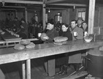 Jewish displaced persons receive bread rations at the Bindermichl displaced persons' camp in Linz.