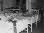 Three survivors rest in their beds at the Hadamar Institute.