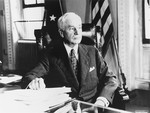 Portrait of Secretary of State Cordell Hull in his office.