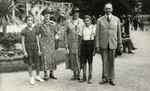 Prewar family portrait of the Steiner and Lakner families posing in an outdoor garden.