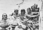 The Hungarian water polo team in the pool at the 11th Summer Olympic Games.
