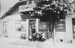 The Schreiber family poses outside their restaurant in Sinaia, Romania.