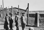 A group of SS officers tour the Hinzert concentration camp.