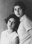 Studio portrait of two Latvian Jewish sisters.

Pictured are Esther Lurie and her sister Shifra.