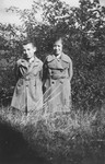 A brother and sister pose in a wooded field near their home in Battenberg, Germany.
