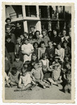 Group portrait of Leah Wajsfelner with other children while she was hiding in France during WWII.
