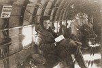 Palestinian Jewish parachutist Uriel Kanner on board an airplane before being dropped into Yugoslavia.