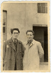 Close-up photograph of two young men wearing Stars of David in the Lodz ghetto.