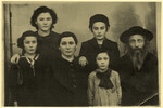 Prewar studio portrait of the Halpern family.

Pictured from left to right are Pnina, Leah, Malka, Meir, Miriam and Yitzchok Halpern.