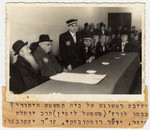 Mordechai Chaim Rumkowski, chairman of the Jewish Council in the Lodz ghetto, attends the swearing-in ceremony for the judges of the Jewish court.