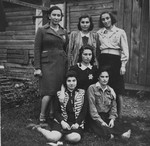 Group portrait of six young women in the Kovno ghetto who are members of the Irgun Brit Zion Zionist youth movement.