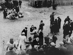Jews are gathered at an assembly point in the Kovno ghetto during a deportation action to Estonia.