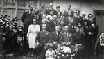 Family and friends, among them members of the Cassorla family gather for a celebration [probably in Bitola].