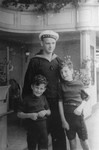 Rolf Altschul and his brother with a member of the crew on board the St.