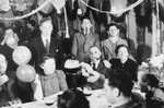A party on board the MS St. Louis.   

Among those pictured are Hermann and Rita Goldstein.
