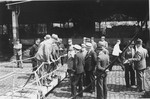 St. Louis Captain Gustav Schroeder negotiates landing permits for the passengers with Belgian officials in the port of Antwerp.