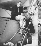 Hans Altschul sits next to his son Rolf on board the St.