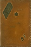 A leather covering of a pocket calendar for the year 1944, printed in the Lodz ghetto, with the initials B.