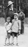 Joel Fabian poses with his mother and sister before leaving for a sanatorium in Davos, Switzerland, where he will be treated for the tuberculosis he contracted while imprisoned in Theresienstadt.