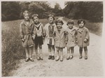 Lore Gotthelf (far right) with friends.

Pictured from left to right are: Elspeth ?; Rudolf Windmuller; Elspeth's sister, Margaret; Ursel Wertheim; Hanna Windmuller; and Lore Gotthelf.