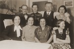 Group portraits of members of the Guttmann and Aisenscharf families in Dresden.