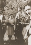 Leo Cohn, a Jewish refugee from Germany who directed the youth center in Strasbourg, leads religious services at an encampment of the Eclaireurs Israelites de France [Jewish Scouts of France].