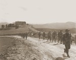 Jewish Brigade soldiers march through the Italian countryside to the front.