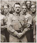 Adolf Hitler poses with a group of SS members soon after his appointment as Chancellor.