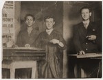 Three Jewish typesetters pose in a print shop in Krynica.