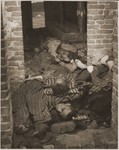 The bodies of prisoners are piled in a brick structure in the newly liberated Woebbelin concentration camp.