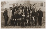 Group portrait of Polish Jews and non-Jews traveling from Warsaw via Gdynia and Le Havre to the United States.