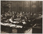 The twenty-three defendants and their lawyers listen to the proceedings of the DoctorsTrial.