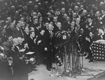 Former Governor Alfred E. Smith addresses the crowd at a mass demonstration held in Madison Square Garden to protest against the Nazi persecution of German Jews.