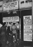 British Jews gather outside one of the offices in London's East End where signatures are being collected for a petition urging the Prime Minister to ease immigration restrictions to Palestine for persecuted Jewish refugees from Nazi-dominated central Europe.