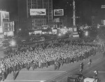 Thousands parade through Columbus Circle in Manhattan in a march to protest against the Nazi persecution of European Jews.